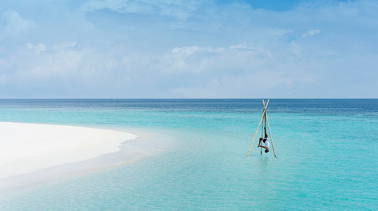 anantara kihavah maldives villas aerial overwater yoga