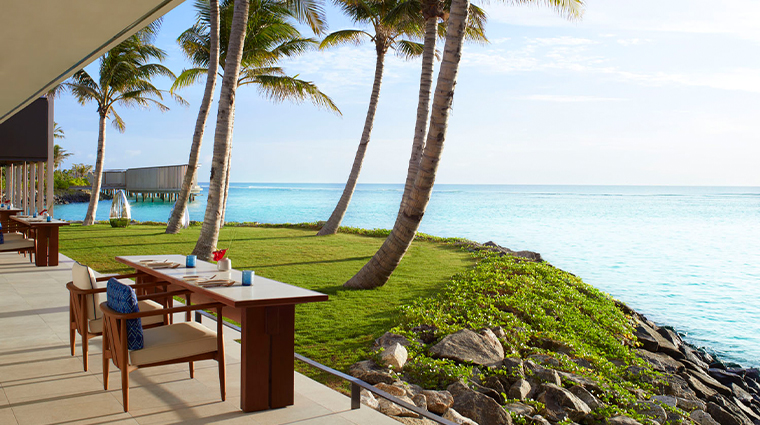 the ritz carlton maldives fari islands la locanda lawn