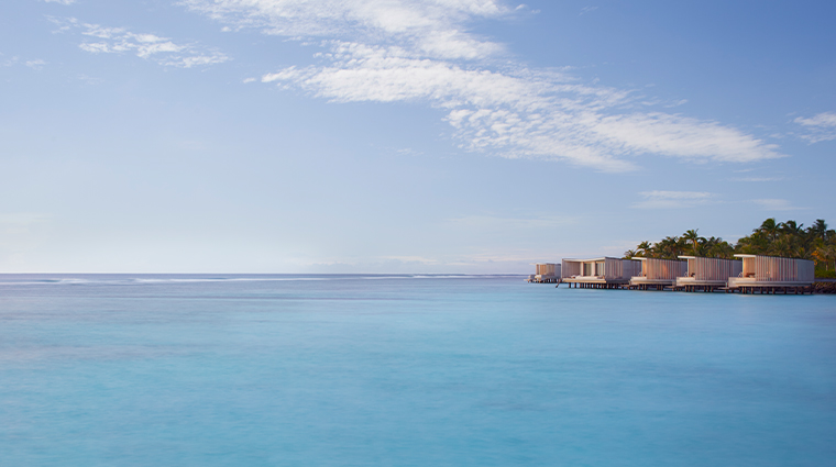 the ritz carlton maldives fari islands villas at sunrise